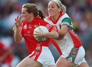 23 September 2007; Briege Corkery, Cork, in action against Ciara McDermott, Mayo. TG4 All-Ireland Ladies Senior Football Championship Final, Cork v Mayo, Croke Park, Dublin. Picture credit; Brian Lawless / SPORTSFILE