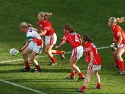 23 September 2007; Cora Staunton, Mayo, is surrounded by  Cork players, left to right, Ciara Walsh, Rena Buckley, Briege Corkery and Angela Walsh. TG4 All-Ireland Ladies Senior Football Championship Final, Cork v Mayo, Croke Park, Dublin. Picture credit; David Maher / SPORTSFILE