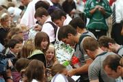 24 September 2007; Ireland's Donncha O'Callaghan, centre, among other players, signs autographs for French school children after squad training. 2007 Rugby World Cup, Pool D, Irish Squad Training, Stade Bordelais, Bordeaux, France. Picture credit: Brendan Moran / SPORTSFILE