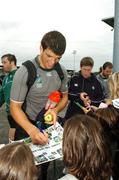 24 September 2007; Ireland's Donncha O'Callaghan, Ronan O'Gara and Geordan Murphy sign autographs for French school children after squad training. 2007 Rugby World Cup, Pool D, Irish Squad Training, Stade Bordelais, Bordeaux, France. Picture credit: Brendan Moran / SPORTSFILE