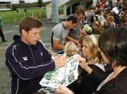 24 September 2007; Ireland's Ronan O'Gara signs autographs for French school children after squad training. 2007 Rugby World Cup, Pool D, Irish Squad Training, Stade Bordelais, Bordeaux, France. Picture credit: Brendan Moran / SPORTSFILE