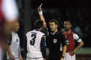 24 September 2007; Referee Alan Kelly shows the yellow card to Dessie Byrne, Bohemians. FAI Ford Cup Quarter Final, St. Patrick’s Athletic v Bohemians, Richmond Park, Dublin. Picture credit; David Maher / SPORTSFILE