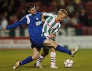 25 September 2007; Liam Kearney, Cork City, in action against Dave Warren, Waterford United. FAI Ford Cup Quarter Final Replay, Waterford United v Cork City, Turner's Cross, Cork. Picture credit; Brian Lawless / SPORTSFILE
