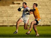 18 January 2015; Ronan McNabb, Tyrone, in action against Niall O'Neill, Antrim. Bank of Ireland Dr McKenna Cup, Group C, Round 3, Tyrone v Antrim, St. Tiernach's Park, Clones, Co. Tyrone. Picture credit: Oliver McVeigh / SPORTSFILE