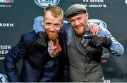 18 January 2015; SBG Gym team-mates Paddy Holohan, left, and Conor McGregor after the post-fight press conference. UFC Fight Night, Conor McGregor v Dennis Siver, TD Garden, Boston, Massachusetts, USA. Picture credit: Ramsey Cardy / SPORTSFILE