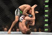 18 January 2015; Charles Rosa, below, in action against Sean Soriano during their featherweight bout. UFC Fight Night, Charles Rosa v Sean Soriano, TD Garden, Boston, Massachusetts, USA. Picture credit: Ramsey Cardy / SPORTSFILE