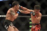 18 January 2015; Tateki Matsuda, right, in action against Joby Sanchez during their flyweight bout. UFC Fight Night, Tateki Matsuda v Joby Sanchez, TD Garden, Boston, Massachusetts, USA. Picture credit: Ramsey Cardy / SPORTSFILE