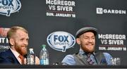 18 January 2015; Paddy Holohan, left, and Conor McGregor during a post-fight press conference. UFC Fight Night, Conor McGregor v Dennis Siver, TD Garden, Boston, Massachusetts, USA. Picture credit: Ramsey Cardy / SPORTSFILE