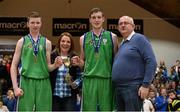 19 January 2015; Ard Scoil Rathangan joint-captains Shane Maughan, left, and James Byrne receive the cup from Jackie Dunne, Chairperson of the board of Basketball Ireland, and Joe Shiels, Chairman of PPSC. All-Ireland Schools Cup U19A Boys Final, St Eunan's College v Ard Scoil Rathangan. National Basketball Arena, Tallaght, Dublin. Picture credit: Barry Cregg / SPORTSFILE