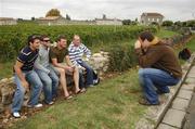 26 September 2007; Irish prop Marcus Horan, right, takes a photograph of team-mates, from left, David Wallace, Gordon D'Arcy, Malcolm O'Kelly and Frankie Sheahan on a visit to the famous vineyards of Saint-Emilion, in the south of France during a rest day ahead of their Pool D game against Argentina on Sunday next. Saint Emilion, France. Picture credit: Brendan Moran / SPORTSFILE