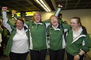 27 September 2007; On their way!: Members of the ladies soccer team, from left, Bernadette Carr, Roscommon, Christine Kelly, Galway, Norita Hedigan, from Cork, and Edel Hannon, Sligo, pictured at Dublin Airport prior to boarding Aer Lingus sponsored flight to London Heathrow en route to the Special Olympics World Summer Games. The 2007 Special Olympics World Summer Games will take place in Shanghai from the 2nd October to the 11th October 2007. Ireland will be represented by a team of 143 athletes and 55 coaches who will participate in 11 sports. Dublin Airport, Dublin. Picture credit: Brian Lawless / SPORTSFILE