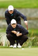 29 September 2007; Simon Dyson and Oliver Wilson, GB&I, line up a putt on the 18th green. The Seve Trophy, Greensomes, The Heritage Golf & Spa Resort, Killenard, Co. Laois. Picture credit: Matt Browne / SPORTSFILE