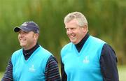 29 September 2007; Graeme Storm, left, with Colin Montgomerie, GB&I, on the 8th green. The Seve Trophy, Foursomes, The Heritage Golf & Spa Resort, Killenard, Co. Laois. Picture credit: Matt Browne / SPORTSFILE