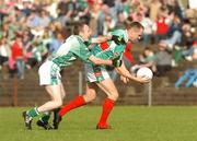 30 September 2007; Gerard Grady, Ballina Stephenites, in action against Kevin Deignan, Charlestown. Mayo Senior Football Championship Final, Ballina Stephenites v Charlestown, McHale Park, Castlebar, Co. Mayo. Picture credit; Pat Murphy / SPORTSFILE