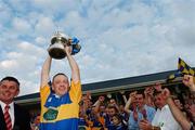 30 September 2007; Dromard captain Padraig Jones lifts the cup at the end of the game. Longford Senior Football Championship Final, Dromard v Colmcille, Pearse Park, Longford. Picture credit; David Maher / SPORTSFILE