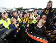 30 September 2007; Aaron Kernan, Crossmaglen Rangers, celebrates winning the Bill McCorry memorial cup, for &quot; Man of the Match&quot; with fans. Nugent's Catering Armagh Senior Football Championship Final, Crossmaglen Rangers v Pearse Og, St Oliver Plunkett Park, Crossmaglen, Co Armagh. Picture credit; Oliver McVeigh / SPORTSFILE