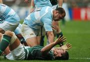 30 September 2007; Donncha O'Callaghan, Ireland, is held down by Gonzalo Longo Elia, Argentina. 2007 Rugby World Cup, Pool D, Ireland v Argentina, Parc des Princes, Paris, France. Picture credit; Brendan Moran / SPORTSFILE