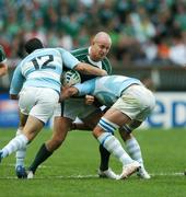 30 September 2007; Denis Hickie, Ireland, is tackled by Felipe Contepomi, left, and Lucas Ostiglia, Argentina. 2007 Rugby World Cup, Pool D, Ireland v Argentina, Parc des Princes, Paris, France. Picture credit; Brendan Moran / SPORTSFILE