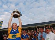 30 September 2007; Padraig Jones, Dromard captain, lifts the cup at the end of the game. Longford Senior Football Championship Final, Dromard v Colmcille, Pearse Park, Longford. Picture credit; David Maher / SPORTSFILE