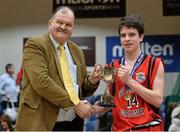 20 January 2015; St Mary's College Galway captain Sean Kelly is presented with the cup from Bernard O'Byrne, Secretary General of Basketball Ireland. All-Ireland Schools Cup U19B Boys Final, St Vincents Glasnevin v St Mary's College Galway, National Basketball Arena, Tallaght, Dublin. Picture credit: David Maher / SPORTSFILE