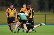 20 January 2015; Yusuf Gbede, St Patricks Classical School Navan, is tackled by Jake Elliott, left, and Ciaran Jermaine, Scoil Chonglais Baltinglass. Bank of Ireland Leinster Schools Fr. Godfrey Cup, 2nd Round, St Patricks Classical School Navan v Scoil Chonglais Baltinglass, Donnybrook Stadium, Donnybrook, Dublin. Picture credit: Barry Cregg / SPORTSFILE