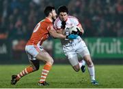 21 January 2015; Mattie Donnelly, Tyrone, is tackled by Stefan Forker, Armagh. Dr. McKenna Cup Semi-Final, Armagh v Tyrone. Athletic Grounds, Armagh. Picture credit: Ramsey Cardy / SPORTSFILE