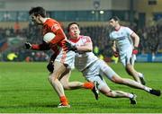 21 January 2015; Tony Kernan, Armagh, is tackled by Colm Cavanagh, Tyrone. Dr. McKenna Cup Semi-Final, Armagh v Tyrone. Athletic Grounds, Armagh. Picture credit: Ramsey Cardy / SPORTSFILE