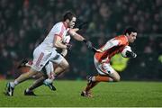 21 January 2015; Jamie Clarke, Armagh, in action against Ronan McNamee, Tyrone. Dr. McKenna Cup Semi-Final, Armagh v Tyrone. Athletic Grounds, Armagh. Picture credit: Ramsey Cardy / SPORTSFILE