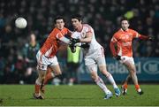 21 January 2015; Mattie Donnelly, Tyrone, in action against Jamie Clarke, Armagh. Dr. McKenna Cup Semi-Final, Armagh v Tyrone. Athletic Grounds, Armagh. Picture credit: Ramsey Cardy / SPORTSFILE