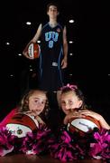 30 September 2007; Cheerleaders from 'Cheer Fusion' in Killister, Lauren Redmond, right, aged 11, from Raheny, and Niamh O'Connor, aged 12, from Portmarnock, with University of Ulster's Matt McColgan at the Basketball Ireland Domestic Season Launch 2007/08. University of Ulster are newcomers into the Men's Super League this year. Basketball Arena, Tallaght, Dublin. Photo by Sportsfile