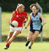 30 September 2007; Eimear O'Connell, Cork, in action against Rhona Markham, Dublin. The Aisling McGing Cup Final, Dublin v Cork, Toomevara, Co. Tipperary. Photo by Sportsfile