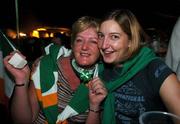 30 September 2007; Judy Doran, Crumlin, Dublin, left, and Nikki Gregg, Hollywood, Co. Down, Irish volunteers at the 2007 Special Olympics World Summer Games in Shanghi, China, watch the 2007 Rugby World Cup, Pool D, Ireland v Argentina game from, Parc des Princes, Paris, France, in O'Malleys Irish Pub in Shanghai, China. Picture credit: Ray McManus / SPORTSFILE