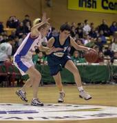 30 January 2000; Ann Marie Kyne of Meteors in action against Cathriona White of Avonmore Wildcats during the Senior Women's Sprite Cup Final match between Avonmore Wildcats and Meteors at National Basketball Arena in Tallaght, Dublin. Photo by Brendan Moran/Sportsfile