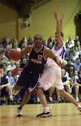 30 January 2000; Anthony Jenkins of Denny Notre Dame in action against Brian Tonkovich of St Vincent's during the Senior Men's Sprite Cup Final match between Denny Notre Dame and St Vincent's at the National Basketball Arena in Tallaght, Dublin. Photo by Brendan Moran/Sportsfile