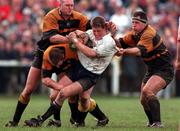 25 April 1999; Ronan O'Gara of Cork Constitution is tackled by Buccaneers players, from left, Colm Rigney Martyn Steffert, top, and Des Rigney during the AIB Rugby League Division 1 Semi-Final match between Cork Constitution v Buccaneers at Temple Hill in Cork. Photo by Matt Browne/Sportsfile