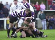 25 March 2000; John Kelly of Cork Constitution is tackled by Peter O'Malley of Terenure during the AIB All-Ireland League Division 1 match between Cork Constitution and Terenure at Temple Hill in Cork. Photo by Brendan Moran/Sportsfile