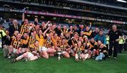 17 March 2000; Crossmaglen Rangers players and officials celebrate with the cup after the AIB All-Ireland Senior Club Football Championship Final match between Crossmaglen and Na Fianna at Croke Park in Dublin. Photo by Damien Eagers/Sportsfile