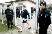 17 November 1999; Damien Duff makes his way through security on his way to a Republic of Ireland training session at Veledrom Stadium in Bursa, Turkey. Photo by Brendan Moran/Sportsfile