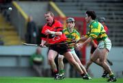 31 October 1999; Dan Murphy of UCC gets past Brian O'Keeffe of Blackrock during the Cork County Senior Club Hurling Championship Final match between Blackrock and UCC at Páirc Uí Chaoimh in Cork. Photo by Brendan Moran/Sportsfile