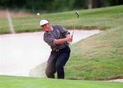31 July 1999; Darren Clarke chips out of a bunker during day two of the Smurfit European Open at the K-Club in Straffan, Kildare. Photo by Matt Browne/Sportsfile