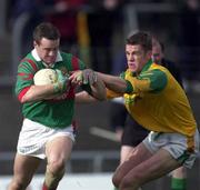 25 March 2000; David Brady of Mayo in action against Nigel Crawford of Meath during the Church & General National Football League Division 1B Round 6 match between Meath and Mayo at Páirc Tailteann in Navan, Meath. Photo by Damien Eagers/Sportsfile