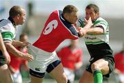 14 August 1999. David Corkery of Munster is tackled by Conor McGuiness, left, and Eric Elwood of Connacht during the Guinness Interprovincial Championship match between Connacht and Munster at the Sportsground in Galway. Photo by Brendan Moran/Sportsfile