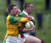 25 March 2000; David Heaney of Mayo in action against Richie Kealy of Meath during the Church & General National Football League Division 1B Round 6 match between Meath and Mayo at Páirc Tailteann in Navan, Meath. Photo by Damien Eagers/Sportsfile