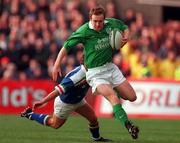 4 March 2000; Denis Hickie of Ireland in action against Diego Dominguez of Italy during the Lloyds TSB 6 Nations match between Ireland and Italy at Lansdowne Road in Dublin. Photo by Damien Eagers/Sportsfile