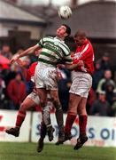 12 January 2000; Graham Lawlor of Shamrock Rovers goes up for the ball with Derek Coughlan and Dave Hill of Cork City during the FAI Cup Second Round Replay match between Cork City and Shamrock Rovers at Turners Cross in Cork. Photo by Matt Browne/Sportsfile