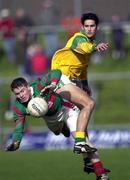 25 March 2000; Dermot Higgins of Mayo in action against Nigel Nestor of Meath during the Church & General National Football League Division 1B Round 6 match between Meath and Mayo at Páirc Tailteann in Navan, Meath. Photo by Damien Eagers/Sportsfile