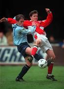 17 March 2000; Dessie Byrne of St Patrick's Athletic is tackled by Richie Baker of Shelbourne during the Eircom League Premier Division match between St Patrick's Athletic and Shelbourne at Richmond Park in Dublin. Photo by David Maher/Sportsfile