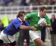 18 March 2000; Dominic Crotty of Ireland is tackled by Laurent Pedrosa of France during the Six Nations A Rugby Championship match between France and Ireland at Stade Marcel-Michelin in Clermont-Ferrand, France. Photo by Matt Browne/Sportsfile