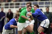 18 March 2000; Dominic Crotty of Ireland is tackled by Laurent Pedrosa, left, and Artur Gomes of France during the Six Nations A Rugby Championship match between France and Ireland at Stade Marcel-Michelin in Clermont-Ferrand, France. Photo by Matt Browne/Sportsfile