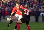 8 January 2000; Dominic Crotty of Munster in action against Mark Mapletoft of Saracens during the Heineken Cup Pool 4 Round 5 match between Munster and Saracens at Thomond Park in Limerick. Photo by Matt Browne/Sportsfile